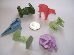 Miniature Star Wars Origami models - shown with a 5p coin for scale